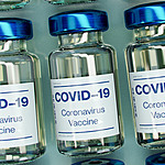 Photo of mock-up COVID-19 vaccine bottles