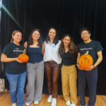 CancerCare and Stupid Cancer staff standing in group and holding pumpkins